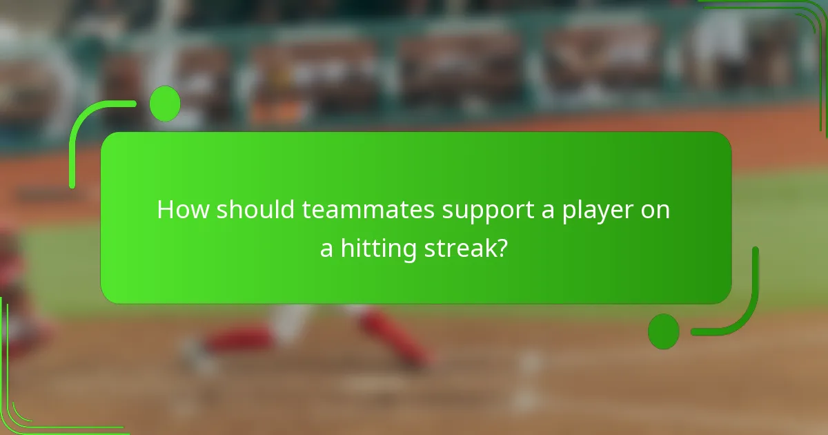 How should teammates support a player on a hitting streak?